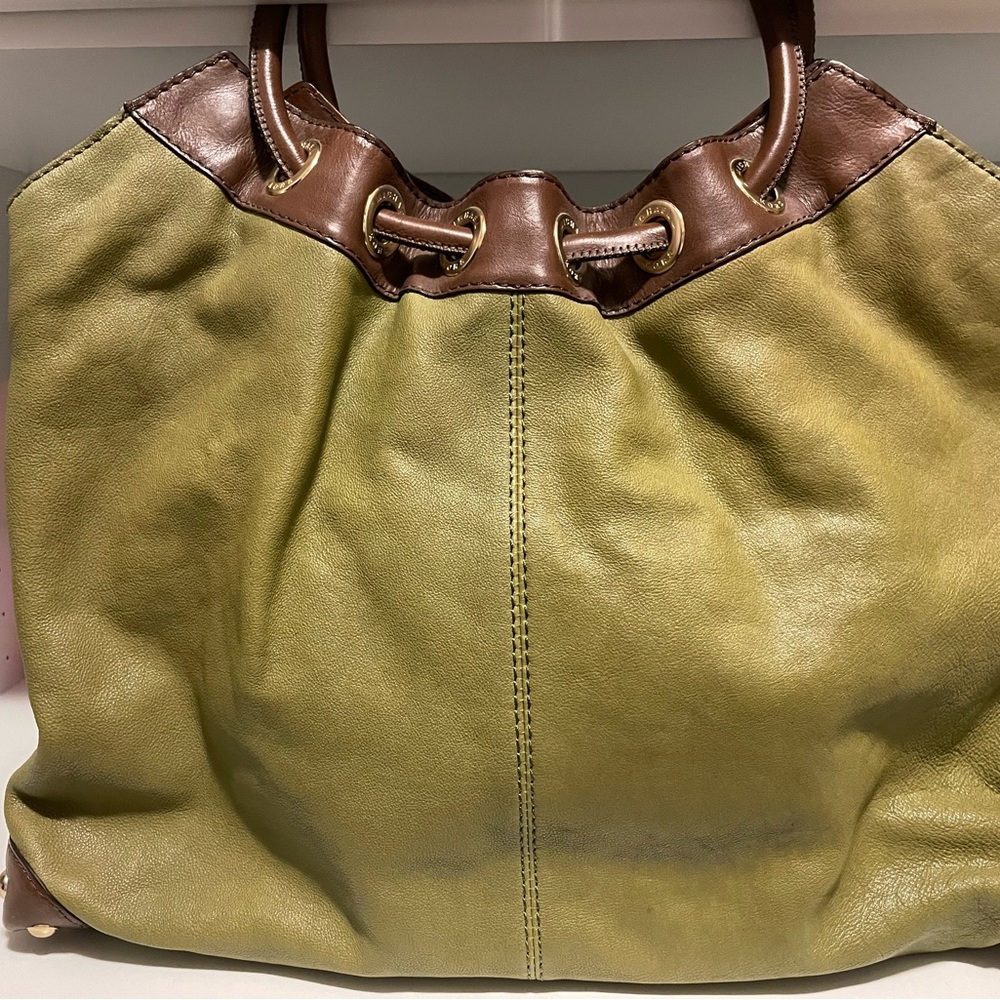 Michael Kors bag in green and brown.  Used 2 or 3 times.
